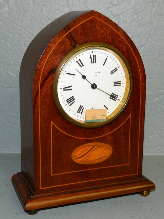 8 day French mahogany inlaid shelf clock.