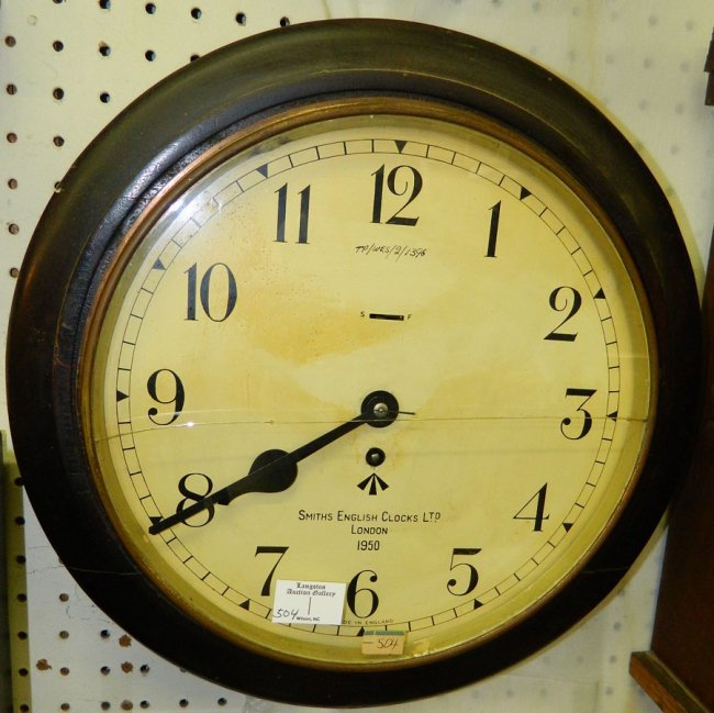 Smith’s 8 day circular mahogany wall clock. 15″