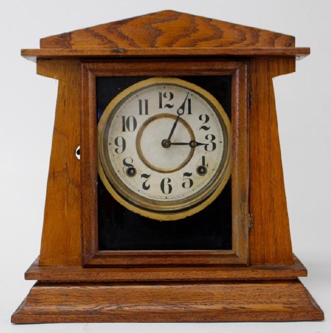 Turn of the century Oak case shelf clock by Elias Ingraham Clock Co