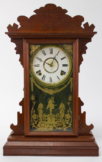 Late 19th century Walnute case kitchen clock by E.N. Welch Clock Co