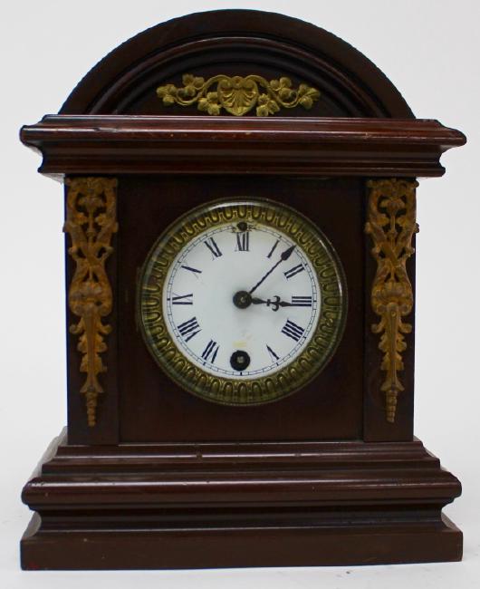 Late 19th century stained Walnut case shelf clock by Ansonia Clock Co