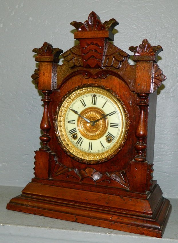 Walnut Victorian Ansonia 8 day clock.