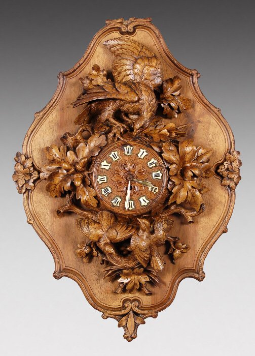 Swiss Black Forrest Style carved oak wall clock