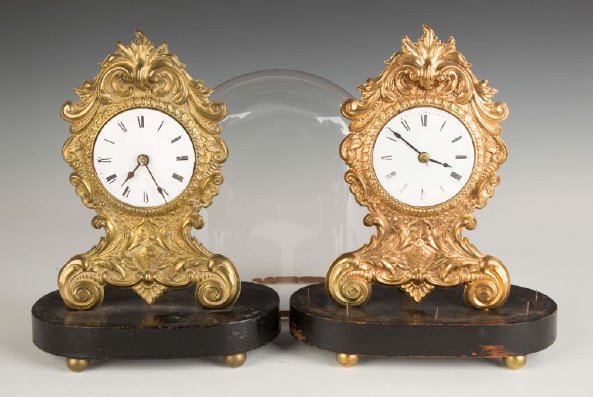 Two Stamped Brass Clocks