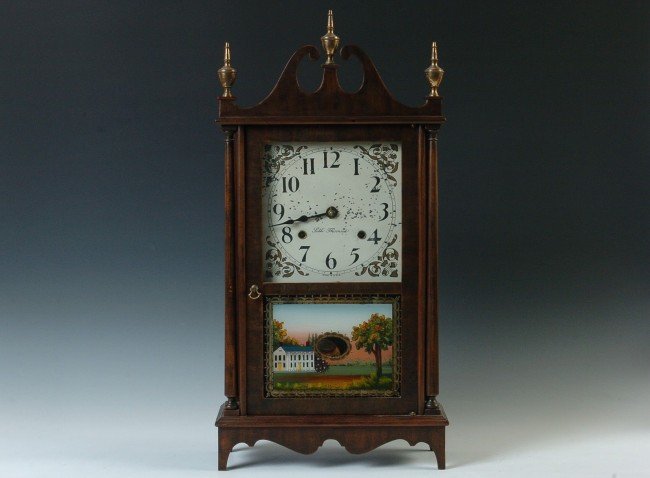 A SETH THOMAS ‘PLYMOUTH’ PILLAR AND SCROLL CLOCK