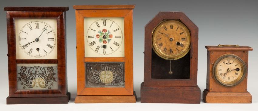 Four Miniature Cottage Clocks