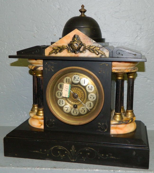 1 day French marble mantle clock w/ bell top.