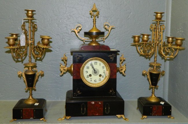 French marble 8 day clock set w/ brass feet.