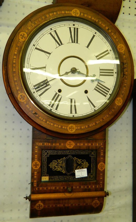 Mahogany inlaid 8 day schoolhouse wall clock .