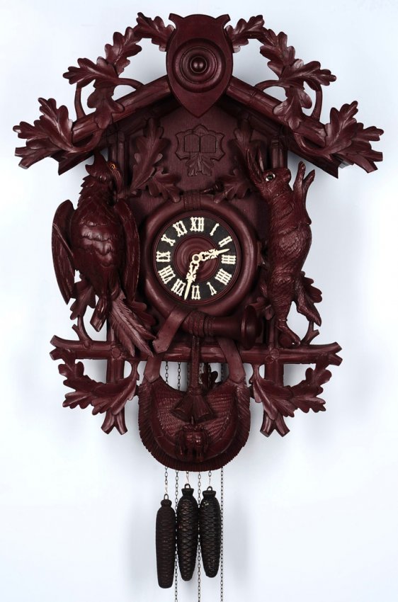 A LARGE EARLY 20TH C. DOUBLE DOOR CUCKOO CLOCK WITH