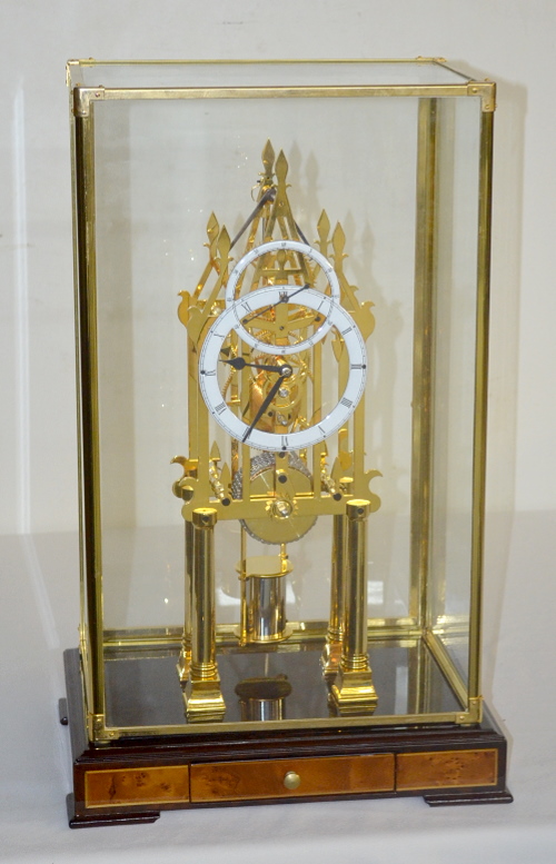 Modern Replica Brass Skeleton Clock in a Glass Case