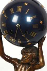 L. Bureau Figural Bronze Clock