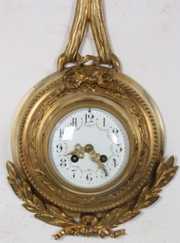 Signed Carre Bronze Pendent Cartel Clock