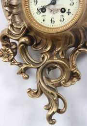 Bronze Wall Hanging Cartel Clock