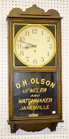 Waterbury “Pelican” Oak Advertising Wall Clock