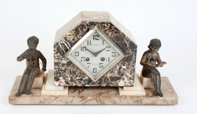 An Art Deco marble mantle clock