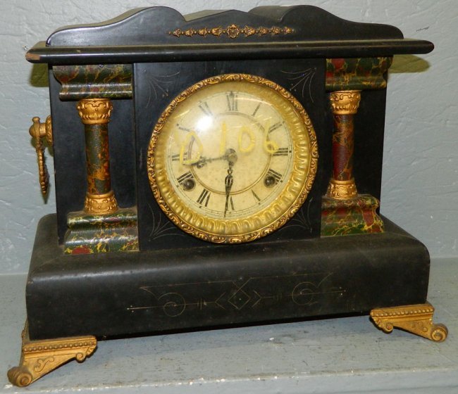 Waterbury shelf clock with faux marble front.