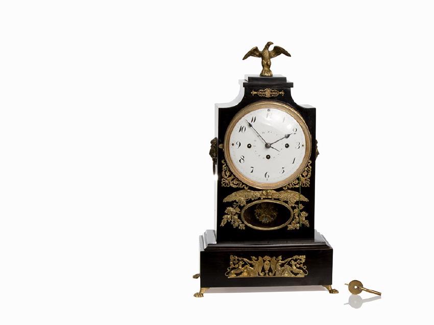 An Ebonized Empire-Table Clock with Calendar, France,