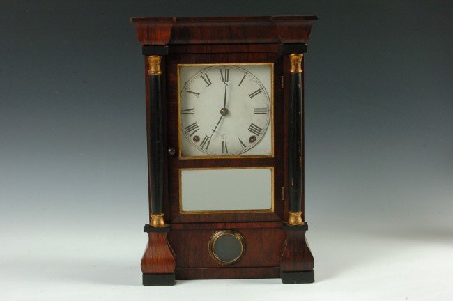 A SETH THOMAS ROSEWOOD SHELF CLOCK WITH LOOKING GLASS