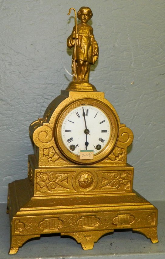 Seth Thomas gold painted figural mantle clock.