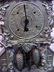 Cast Speltzer Metal Cuc Coo Clock
