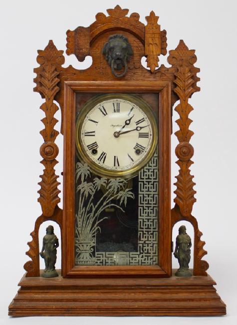 Early 20th century Oak case kitchen clock by Elias Ingraham Clock Co