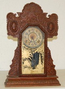 E. Ingraham Oak Kitchen Clock w/ Lions