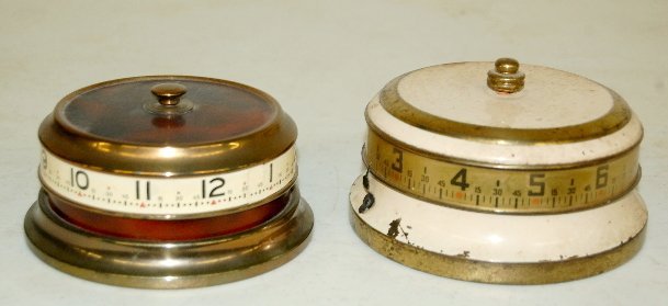 2 Tape Measure Clocks, U.S.A. & German