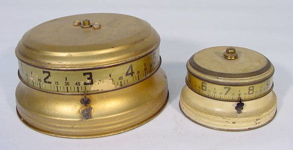 2 U.S.A. Tape Measure Clocks