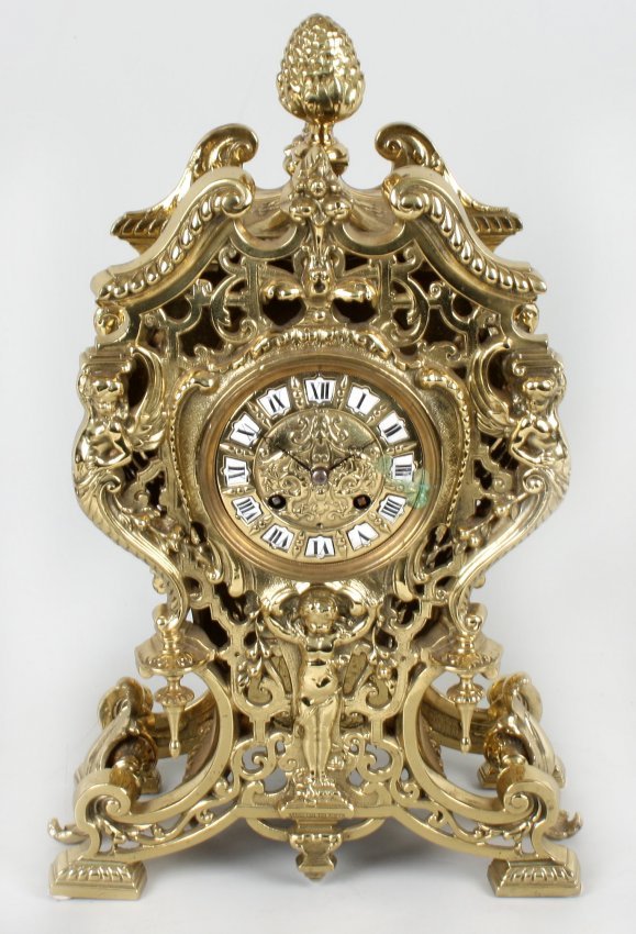 A 19th century French cast brass mantel clock