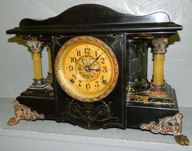 Seth Thomas  mantle clock w/faux marble detail.