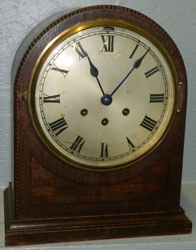 Gustave Becker inlaid oak 8 day shelf clock.