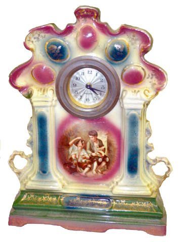 German Porcelain “Melon Eaters” Clock