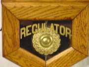 Sessions Oak Octagonal Wall Calendar Regulator