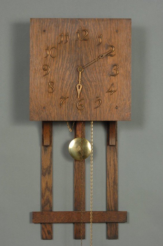 A MONITOR CLOCK WORKS MISSION STYLE OAK CLOCK