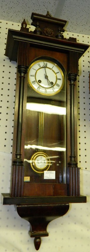 Viennese mahogany 8 day pendulum clock.