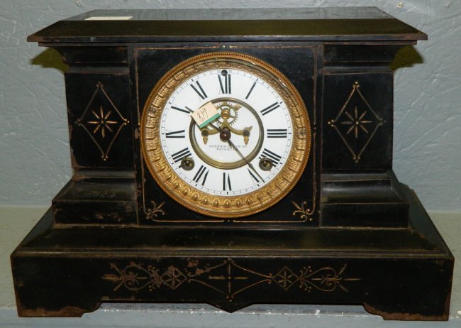 Ansonia black iron case 8 day clock.
