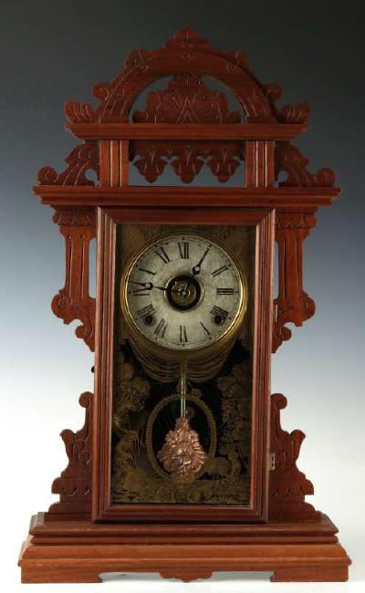 A SETH THOMAS ‘ECLIPSE’ WALNUT PARLOR CLOCK