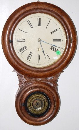 E.N. Welch Walnut Double Round Wall Clock