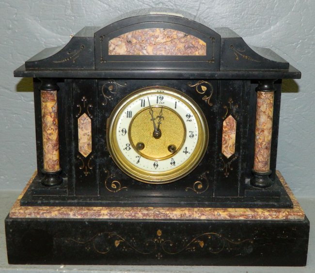 Black & brown marble clock w/marble inserts.