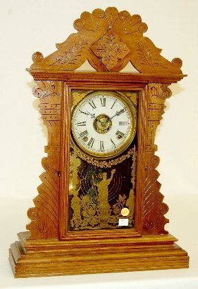 E.N. Welch Walnut “Marie Tempest” Kitchen Clock