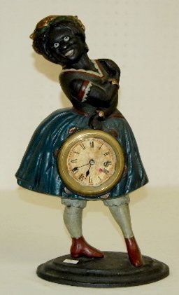 Cast Iron Topsy Blinking Eye Figural Clock