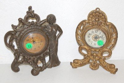2 Antique Iron Clocks, Lady & Dolphin