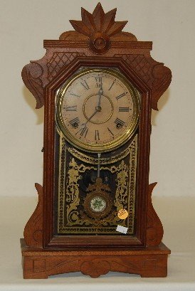 Gilbert Walnut “Arcus” Carved Kitchen Clock
