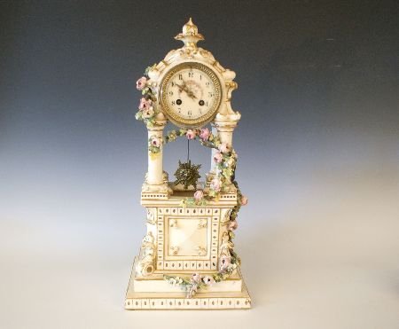 AN UNUSUAL FRENCH CHINA CASE PORTICO CLOCK