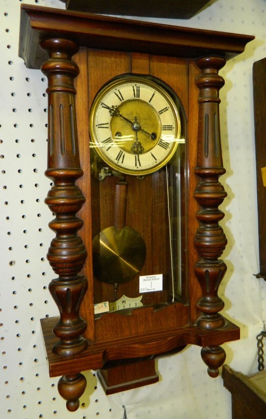 Mahogany 8 day spring wound wall clock.