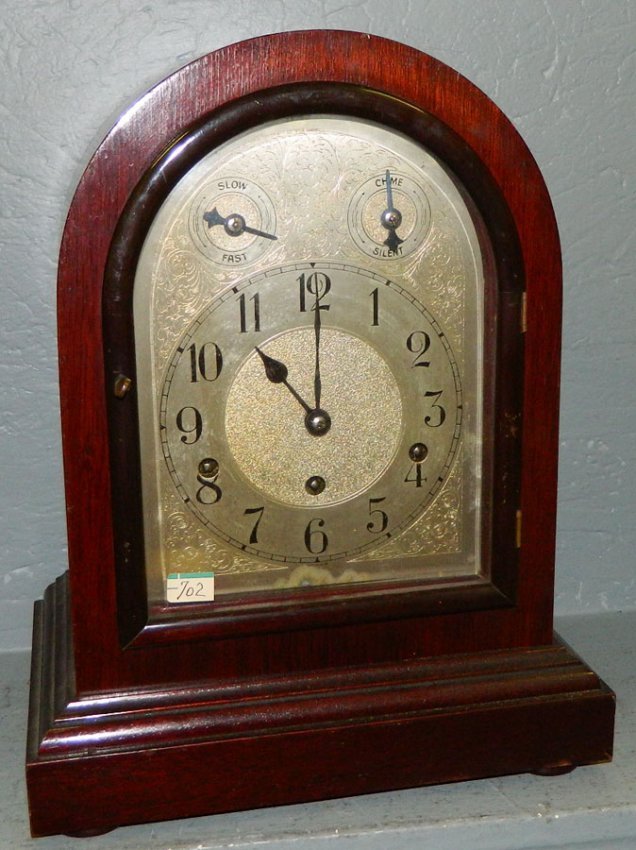 German mahogany 8 day chiming clock.