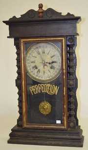 Gilbert “Perfection” Walnut Calendar Clock