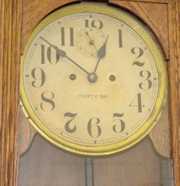 New Haven “Vamoose” Oak Hanging Clock