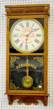 Ingraham “Coca Cola” Oak Store Regulator